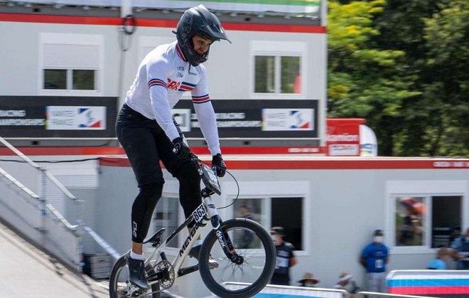 Jay Bovill riding a BMX at a competition.